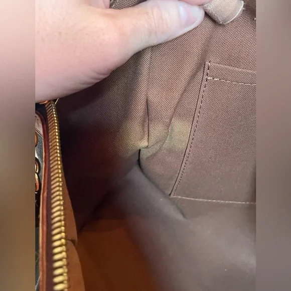 Louis Vuitton Tivoli GM Monogram - Picture 14 of 15